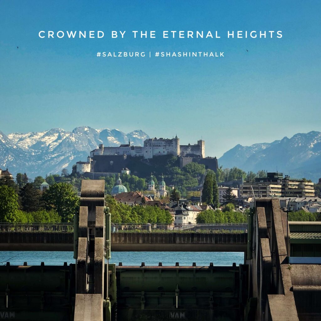 Hohensalzburg Fortress above Salzburg with the snowy Alps behind